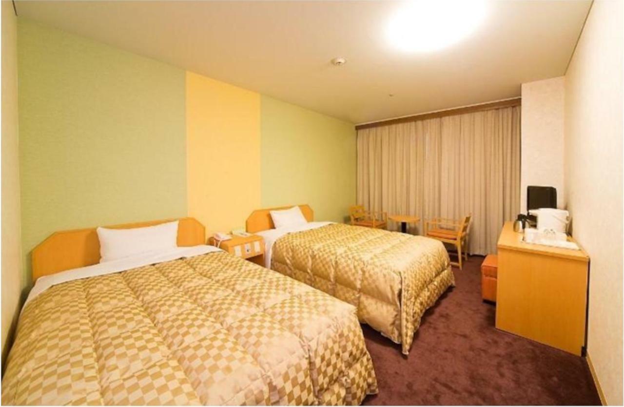 Highness Hotel Kurume Bagian luar foto